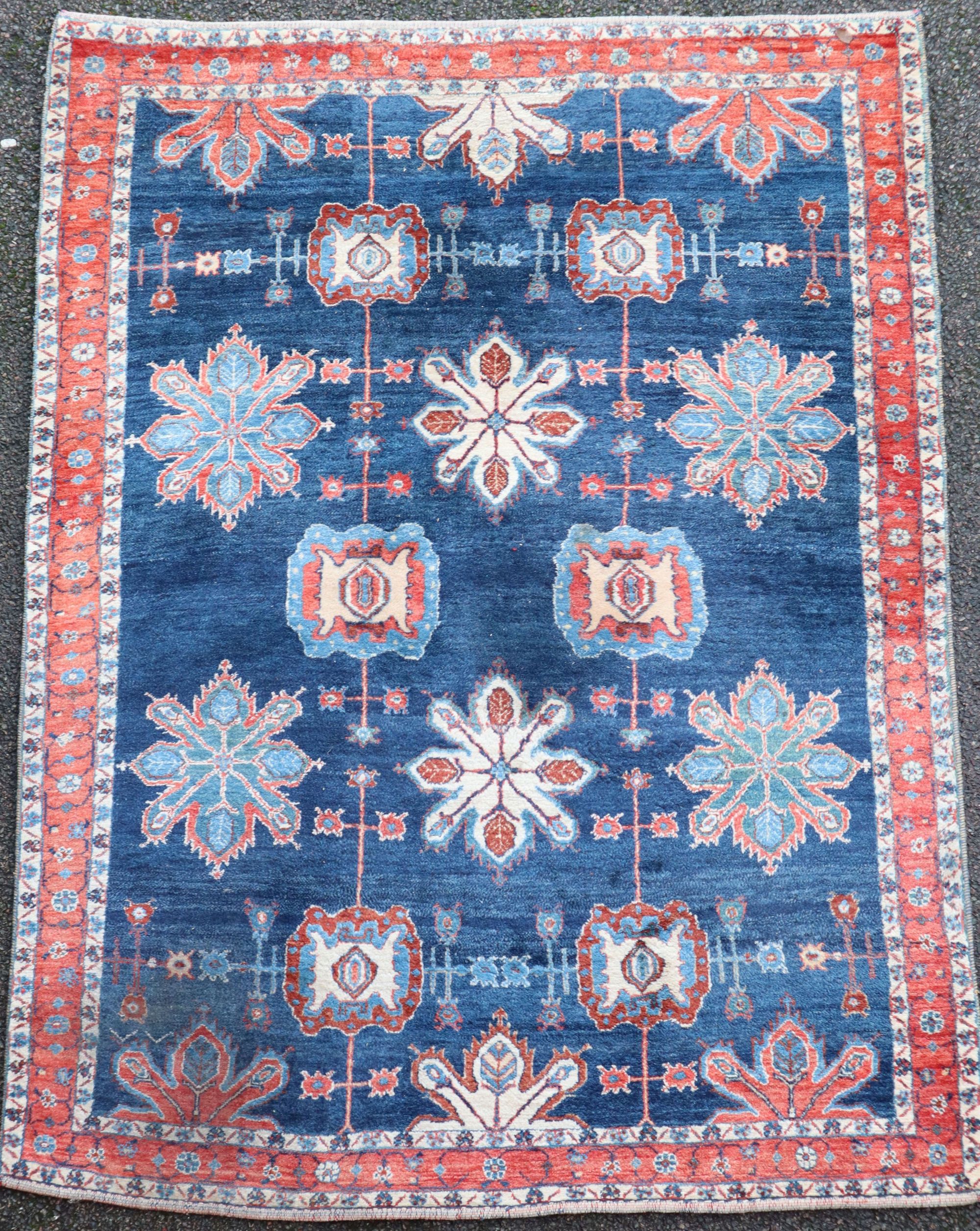 An Iranian Loribaft blue ground rug, 7ft 6in by 5ft 8in.